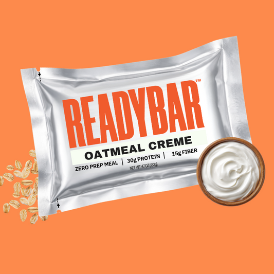 READYBAR Oatmeal Creme package with a oats and marshmallow cream on an orange background