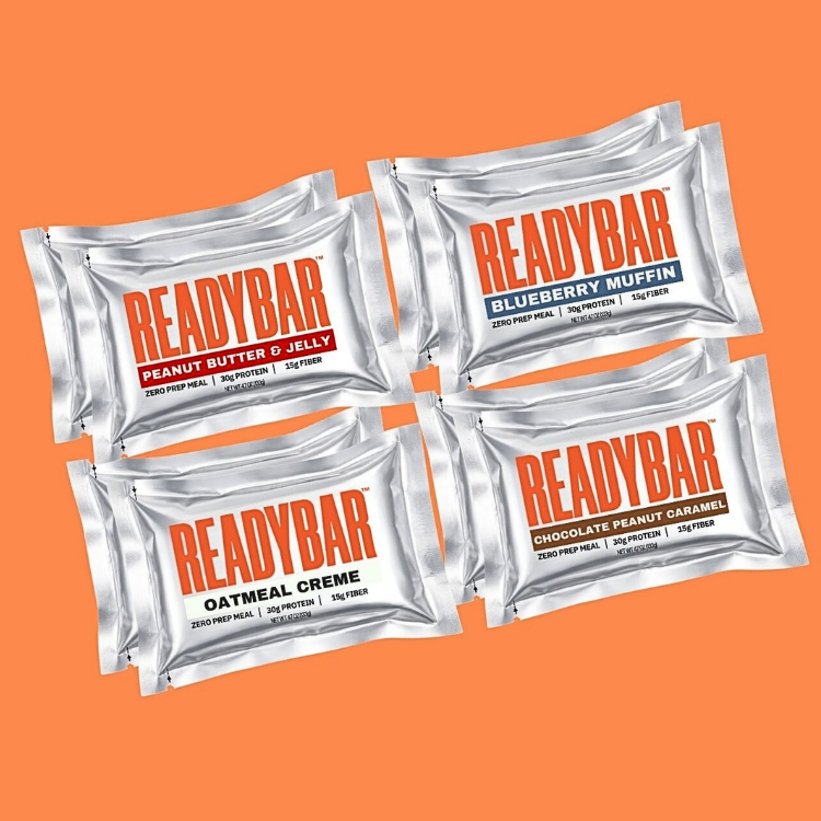 All four flavors of READYBAR on an orange background