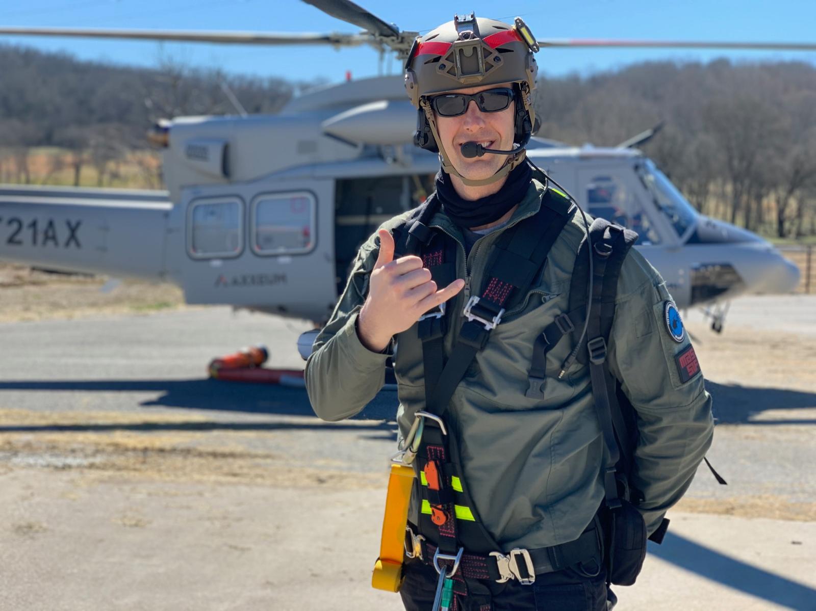 READYBAR advisor Jason Quinn standing in front of helicopter.